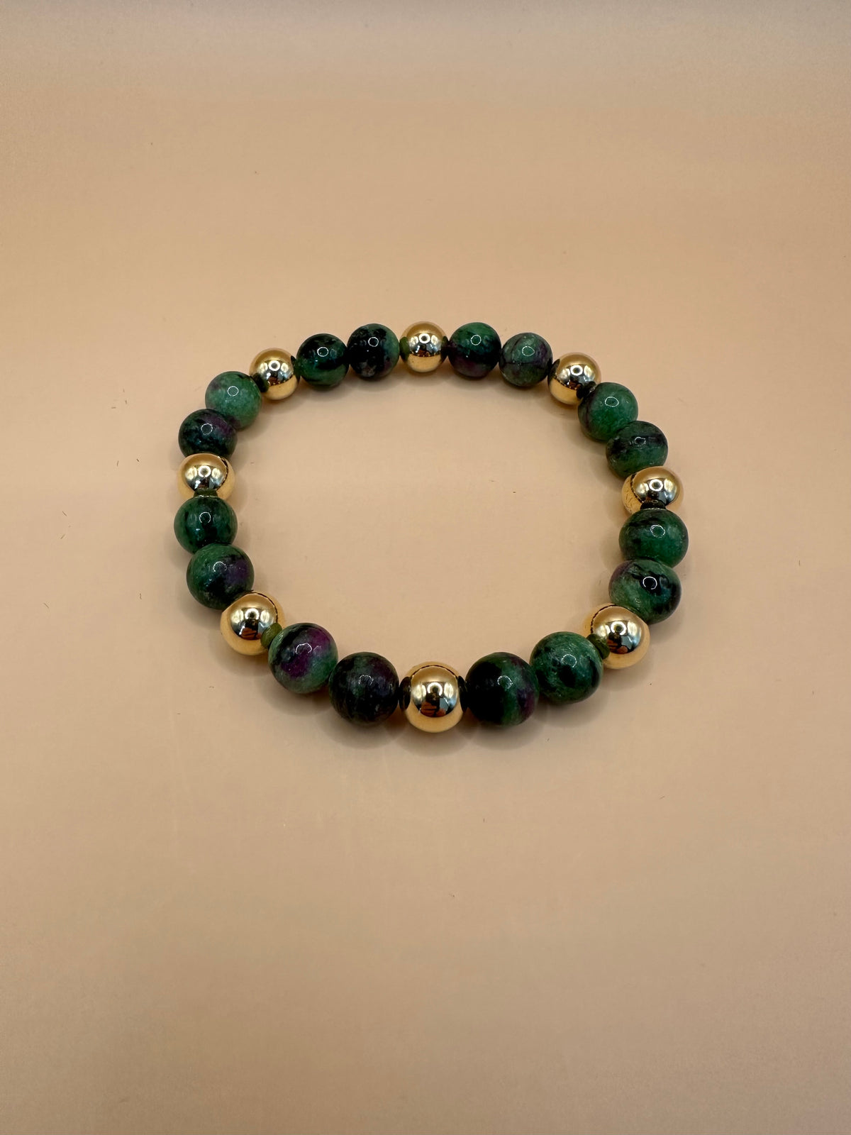 ARMBAND RUBIN-ZOISIT MIT 9k GOLD (8mm)