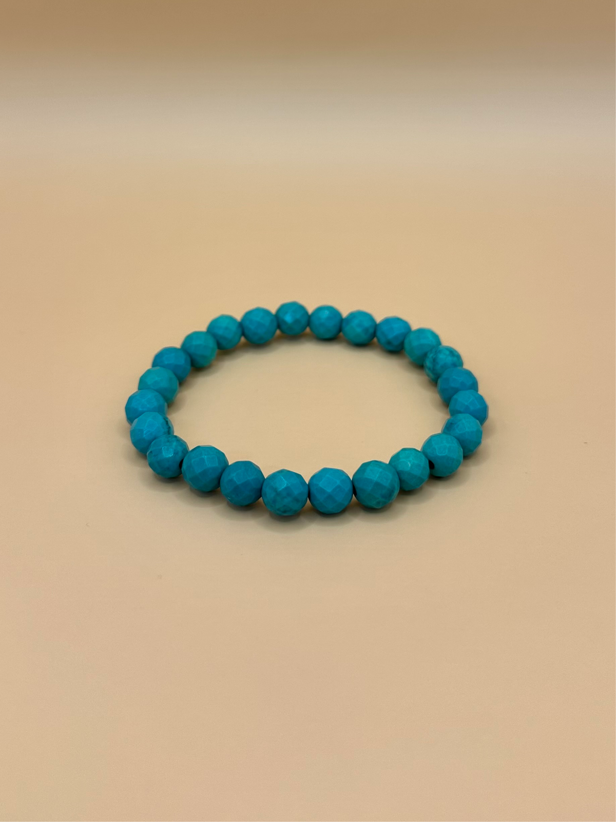 ARMBAND TÜRKIS FACETTIERT (8mm)