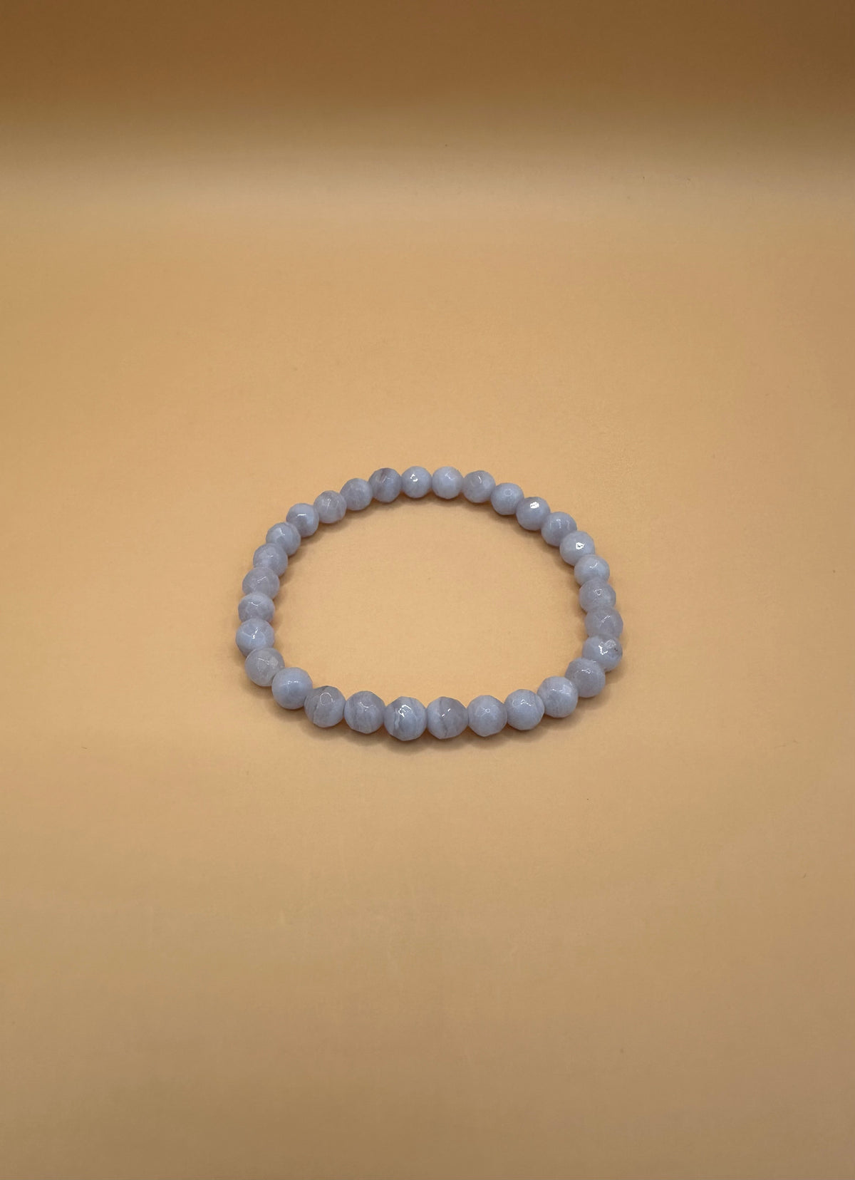 ARMBAND CHALCEDON FACETTIERT (6mm)