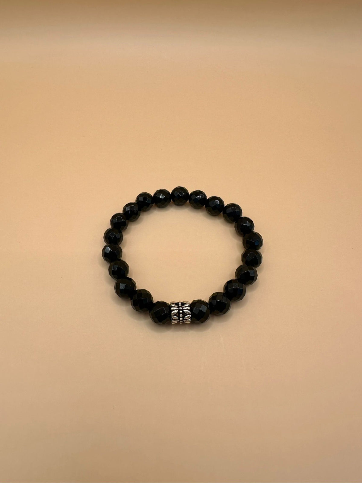 ARMBAND ONYX FACETTIERT MIT 925 SIIBER (8mm)